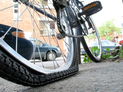 Flat tyre bicycle on the road