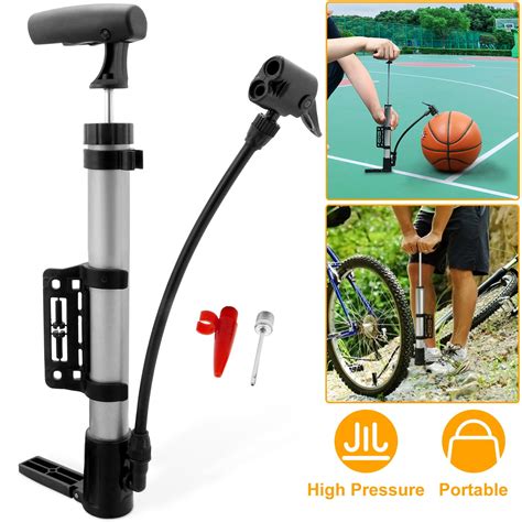 Mini pump inflating a bicycle tyre